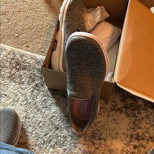 Men's never worn dark heather gray slip on's.
